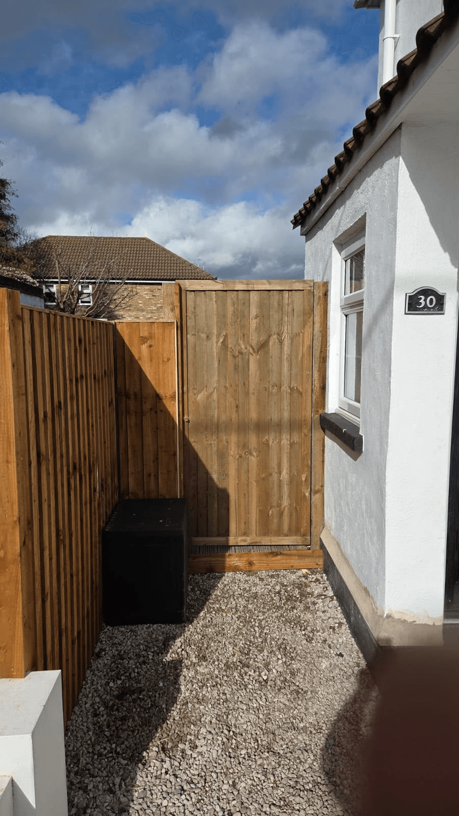 Completed timber fence and gate on exterior