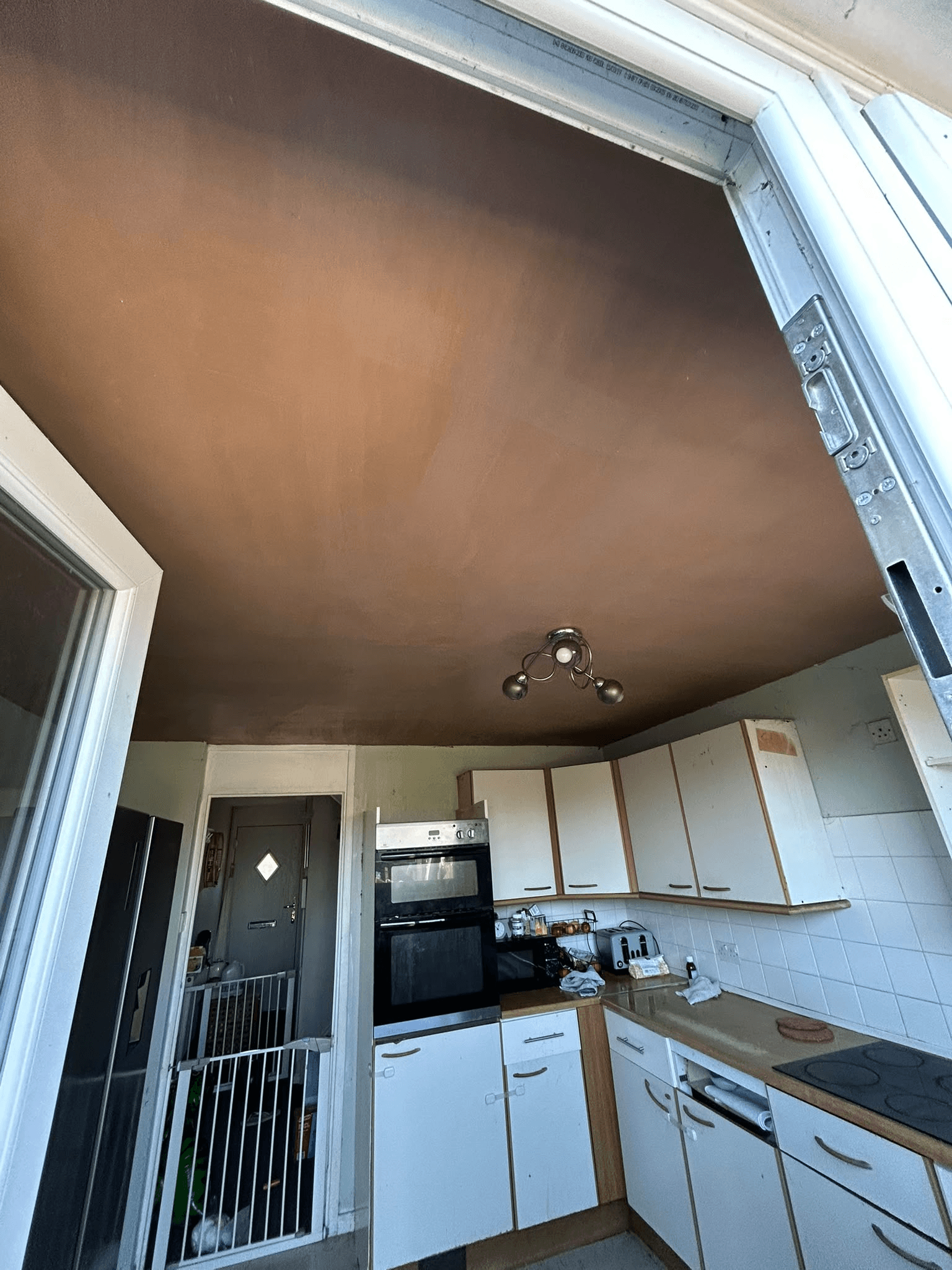 Freshly plastered kitchen ceiling